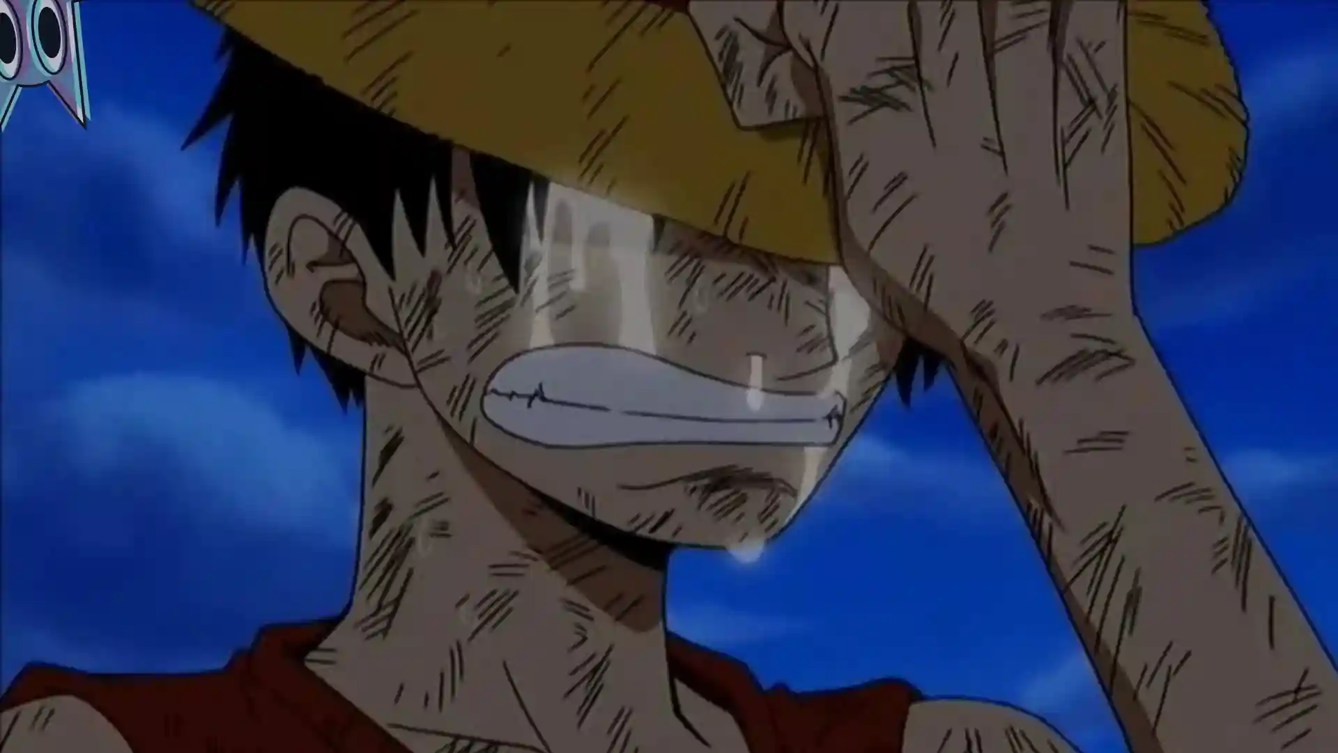 Uma imagem de Luffy chorando, anunciando o adiamento do capítulo 1162 de One Piece.